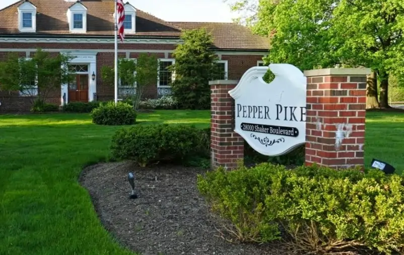 The Pepper Pike city sign in front of the village hall, representing the upscale and safe community living in this Cleveland suburb.
