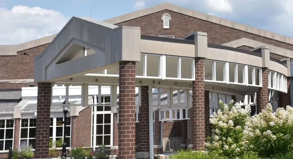 The modern brick entrance of a public school in Solon, Ohio, highlighting the city's commitment to educational excellence in a safe community.